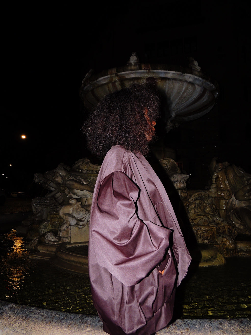 Giacca oversize lucida senza bottoni